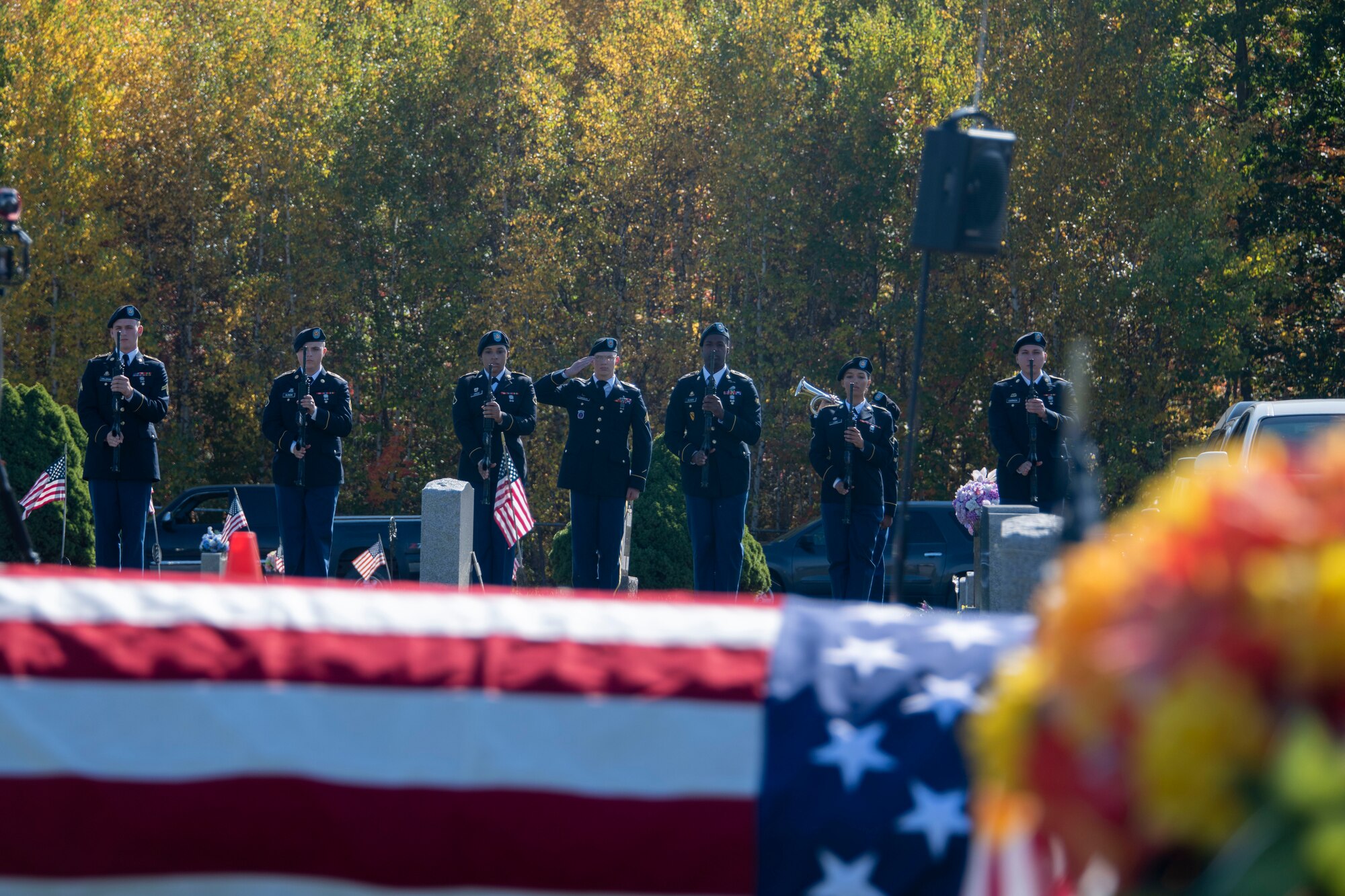 Members of the U.S. Army Honor Guard team from Fort Drum, New York, fold the American Flag for the funeral of U.S. Army Air Forces 2nd Lt. Earnest Vienneau, 97th Bombardment Group, at Millinocket, Maine, Oct. 9, 2021. The ceremonial procedure to properly fold an American flag is to fold it 13 times in a specific manner,with each fold having its own specific meaning. (U.S. Air Force photo by Staff Sgt. Cody Dowell)