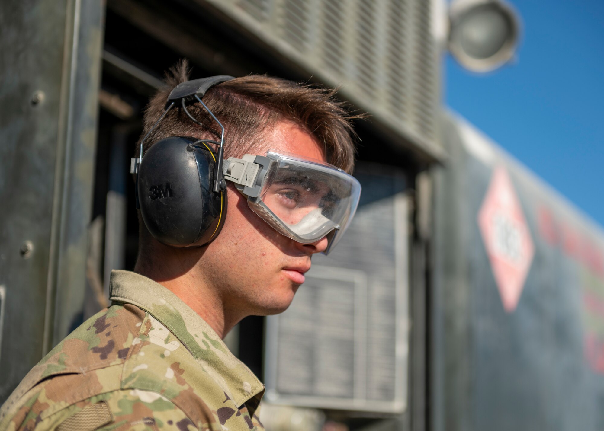 U.S. Airmen from the 332nd and 378th Air Expeditionary Wings conduct hot pit refueling of two U.S. F-16 Fighting Falcons Sept. 30, 2021, at an undisclosed location in Southwest Asia. The F-16s were forward-deployed from the 378th AEW, Prince Sultan Air Base, Kingdom of Saudi Arabia. Maintenance crews assigned to the 332nd and 378th AEWs conducted a hot-pit refueling training exchange over the course of several weeks, increasing their agile combat employment capabilities by ensuring both F-16 Fighting Falcons and F-15E Strike Eagles can be refueled by each wing. (U.S. Air Force photo by Master Sgt. Traci Keller)