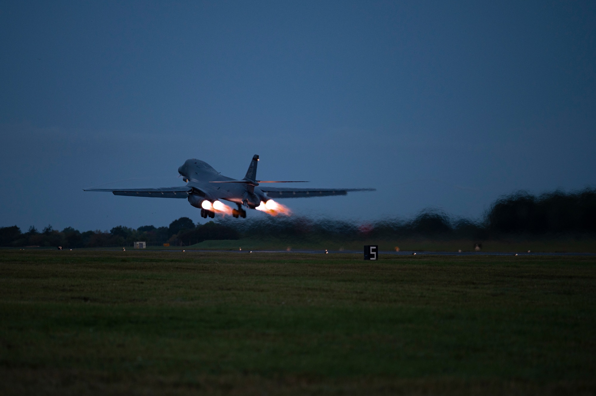 A B-1B Lancer assigned to the 9th Expeditionary Bomb Squadron takes off at RAF Fairford, United Kingdom, to conduct a Bomber Task Force Europe mission, Oct. 11, 2021. BTF Europe missions allow aircrew to routinely integrate and train with ally and partner forces, enhancing operational coordination and interoperability. (U.S. Air Force photo by Senior Airman Colin Hollowell)