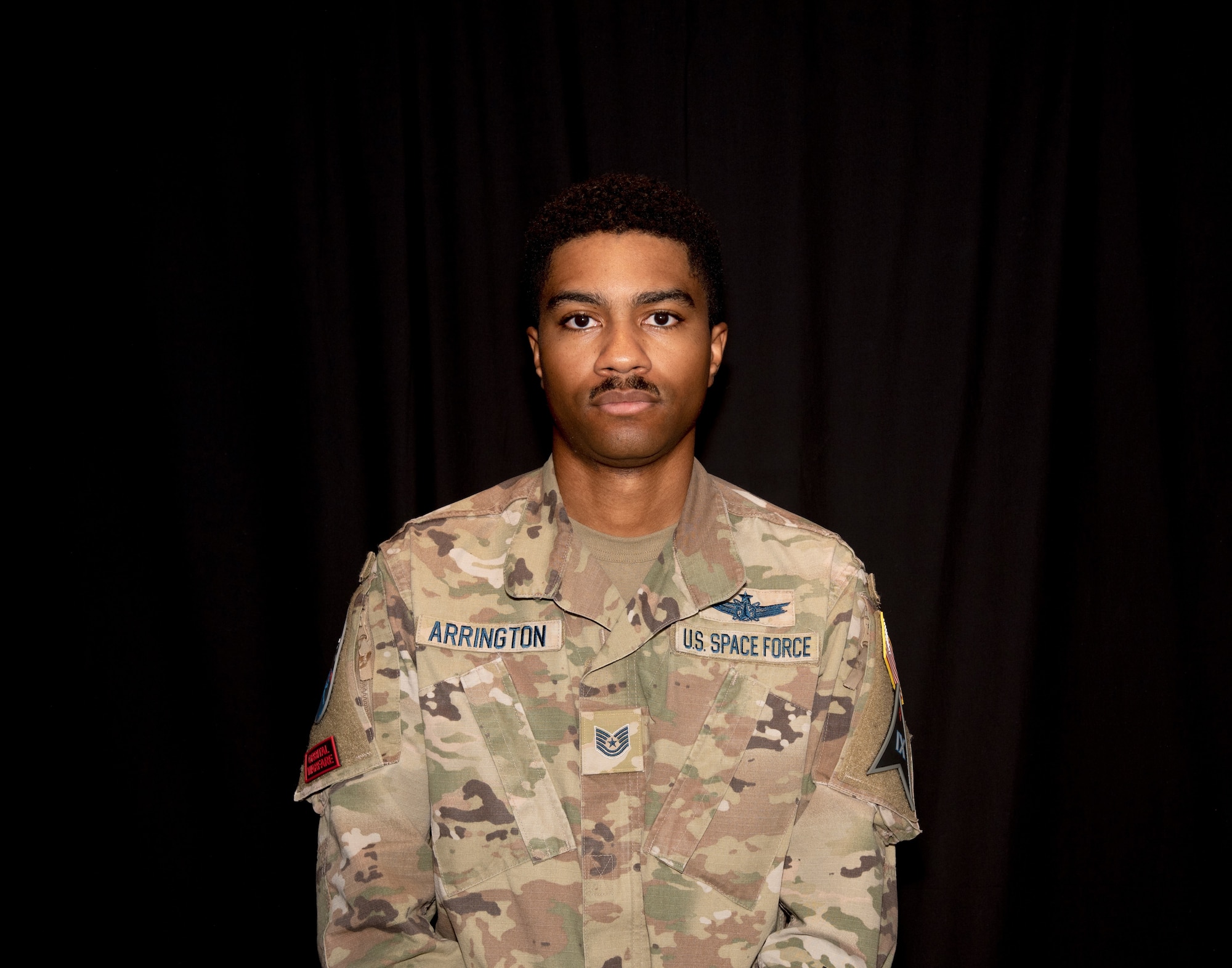 TSgt Arrington poses for portrait photo