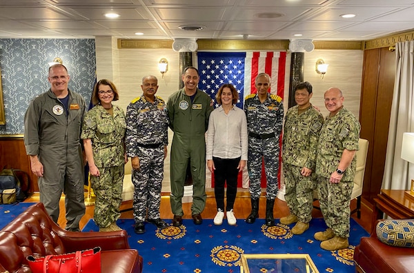 BAY OF BENGAL (Oct. 14, 2021) Chief of Naval Operations Adm. Mike Gilday, right, poses for a photo with distinguished visitors from the Indian Navy including Indian Chief of Naval Staff Adm. Karambir Singh and Vice Adm. A.B. Singh, Commander in Chief, Eastern Naval Command, U.S. Chargé d’Affaires Patricia Lacina, Rear Adm. Dan Martin, Commander, Carrier Strike Group 1, and other U.S. Navy senior leaders aboard USS Carl Vinson (CVN 70) during Exercise Malabar. MALABAR is a maritime exercise designed to improve integration, address common maritime security priorities and concerns, enhance interoperability and communication, and strengthen enduring relationships between the Royal Australian Navy, Royal Indian Navy, JMSDF, and U.S. maritime forces. (U.S. Navy photo by Cmdr. Nate Christensen/Released)