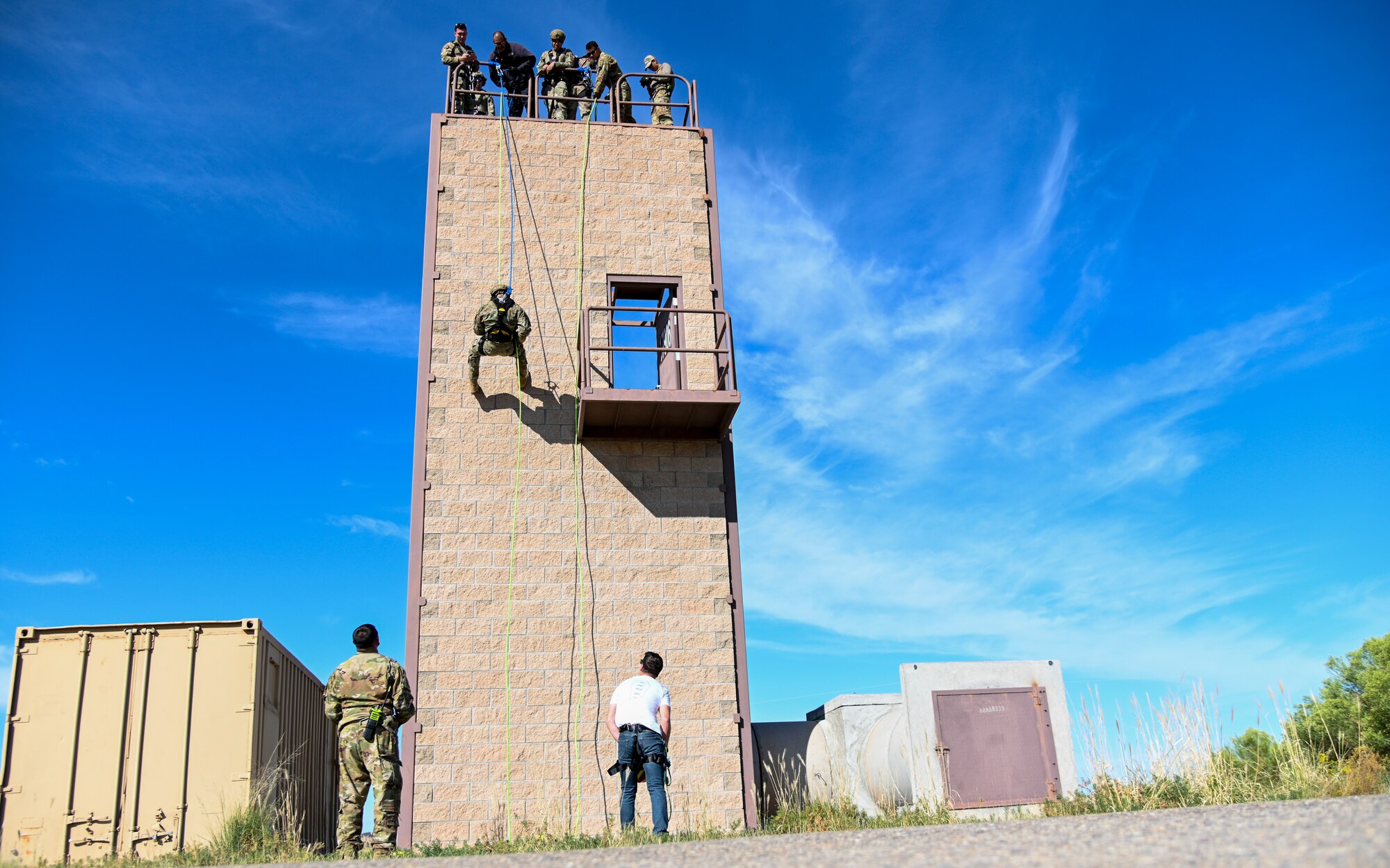 Members from the 49th Security Forces Squadron and 49th Civil Engineer Squadron participate in the 49th Wing’s first rappel skills training, Oct. 5, 2021, on Holloman Air Force Base, New Mexico. The training lasted two days, one day for learning about the equipment in the classroom and the second for practical skills application. (U.S. Air Force photo by Airman 1st Class Jessica Sanchez-Chen)