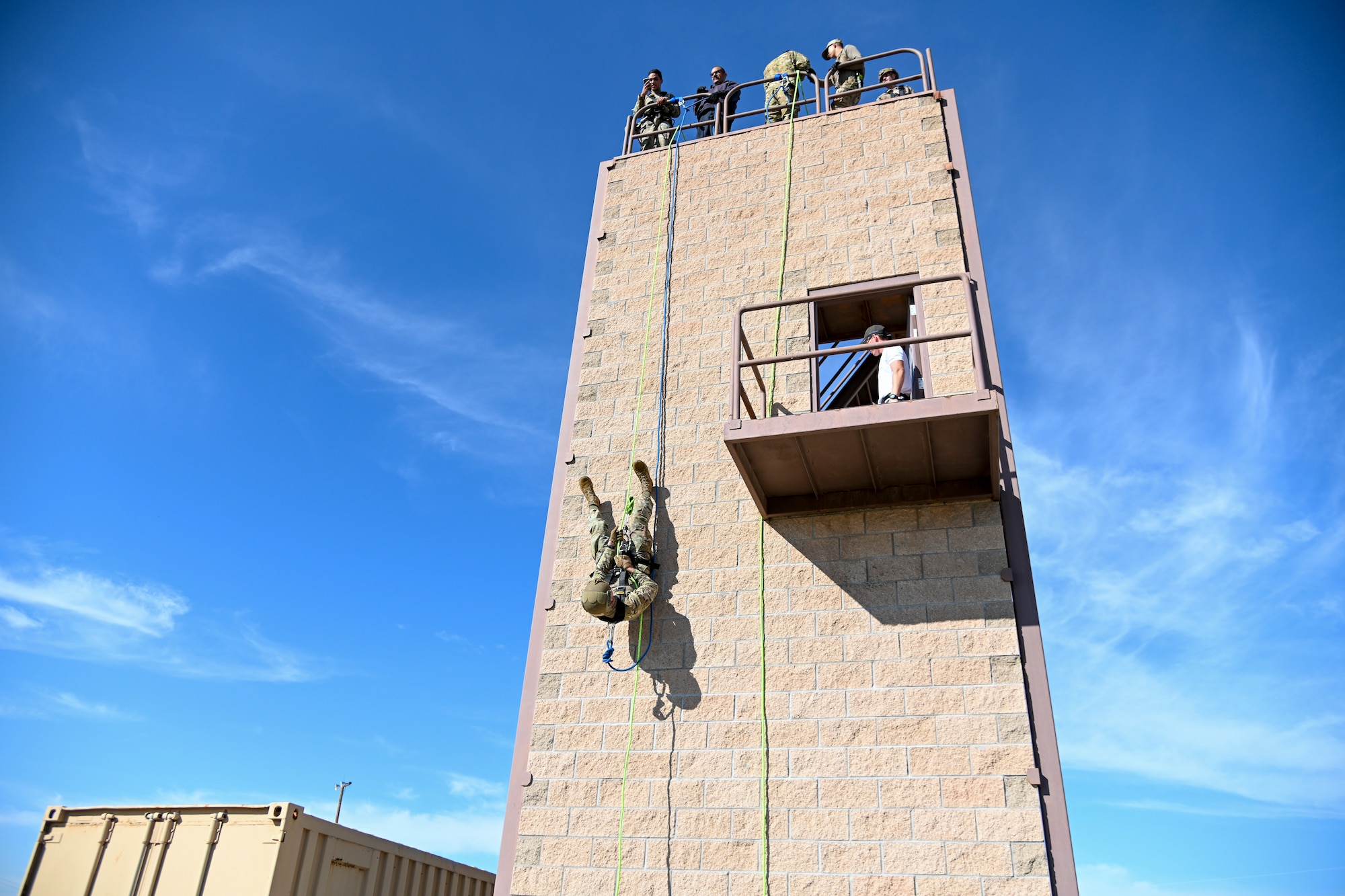 Members from the 49th Security Force Squadron and 49th Civil Engineer Squadron participate in the 49th Wing’s first rappel skills training, Oct. 5, 20201, on Holloman Air Force Base, New Mexico. The rappel training provides an additional skill set for 49th Wing first responders. (U.S. Air Force photo by Airman 1st Class Jessica Sanchez-Chen)
