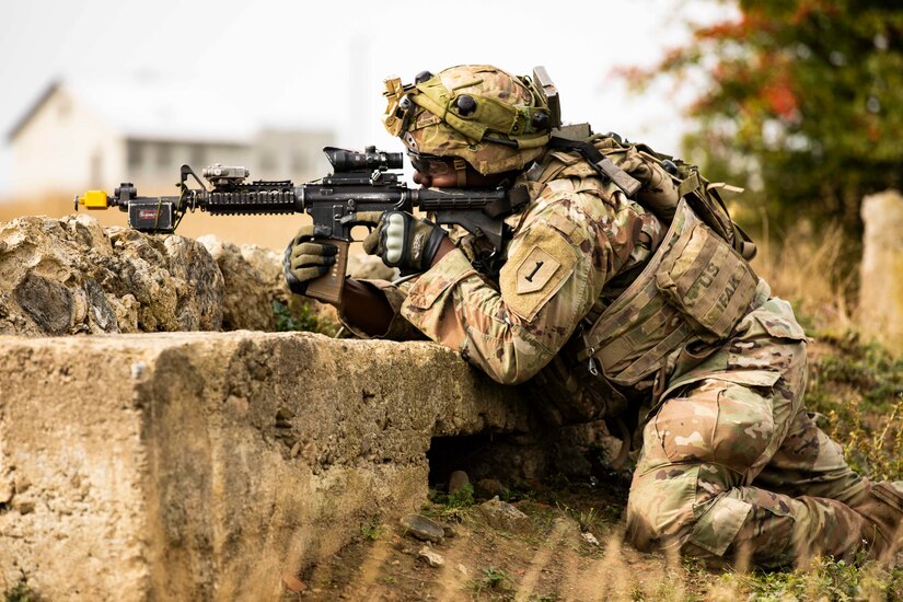 U.S. Army Spc. Daron Hutson, Alpha Company, 1st Battalion, 16th Infantry Regiment “Iron Rangers,” 1st Armored Brigade Combat Team, 1st Infantry Division, pulls security during a multinational situational training exercise in Cincu, Romania