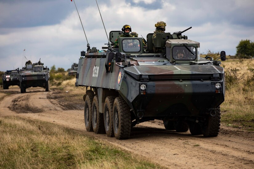 Romanian Soldiers convoy toward an objective during a multinational situational training exercise in Cincu, Romania