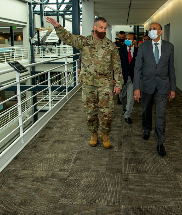 U.S. military and Indian government officials meet.