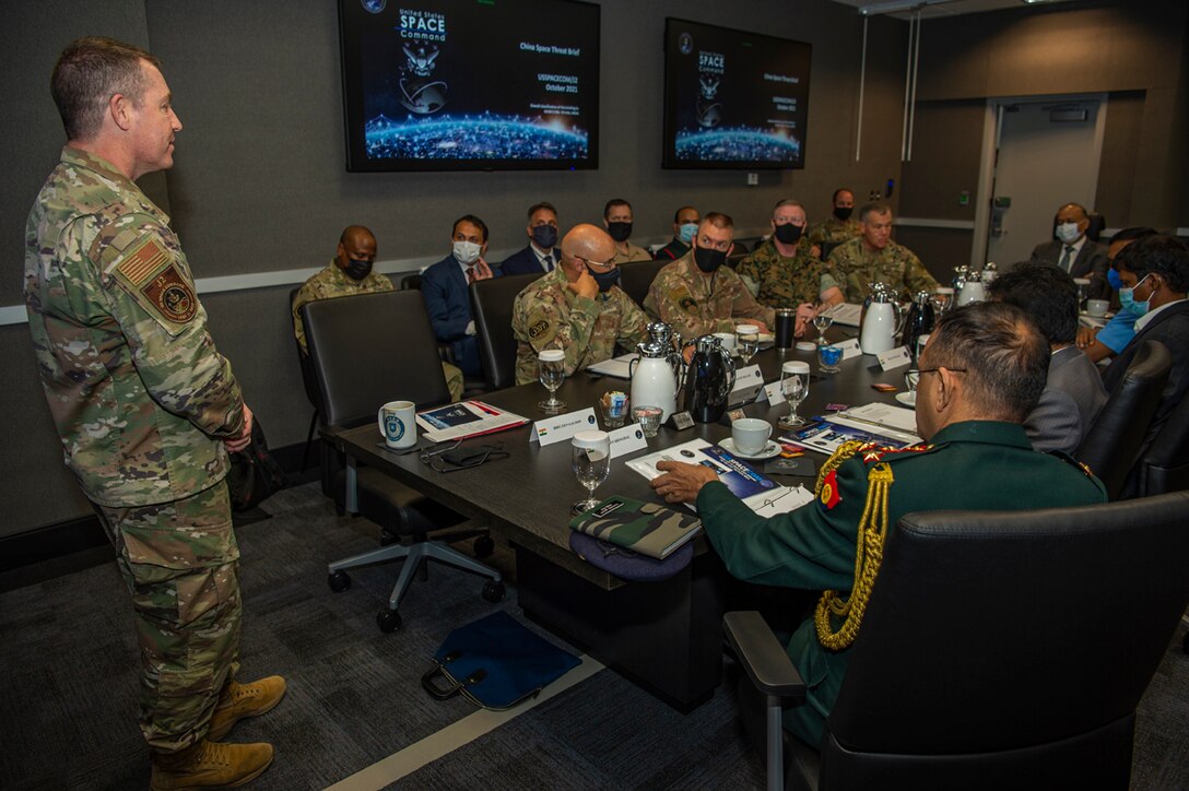 U.S. military and Indian government officials meet.