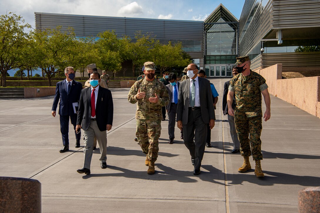 U.S. military and Indian government officials meet.