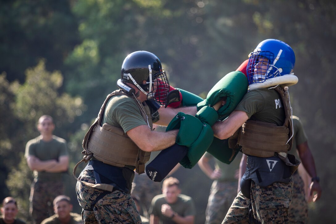 U.S. Marines with Marine Fighter Attack Training Squadron (VMFAT) 501, Marine Aircraft Group 31, compete in the Warlord Games at MCAS Beaufort, South Carolina, Oct. 1, 2021. The Warlord Games is a competition between the sections within VMFAT-501, they participate in different physical events such as, tire flipping, pugil sticks, ammo can lifts, squad pushups, pole toss, fireman carry sprint, 4x100 race and a HMMV pull, earning them points throughout the day. The powerline section took home the winners' belt. (U.S. Marine Corps photo by Cpl. Aidan Parker)