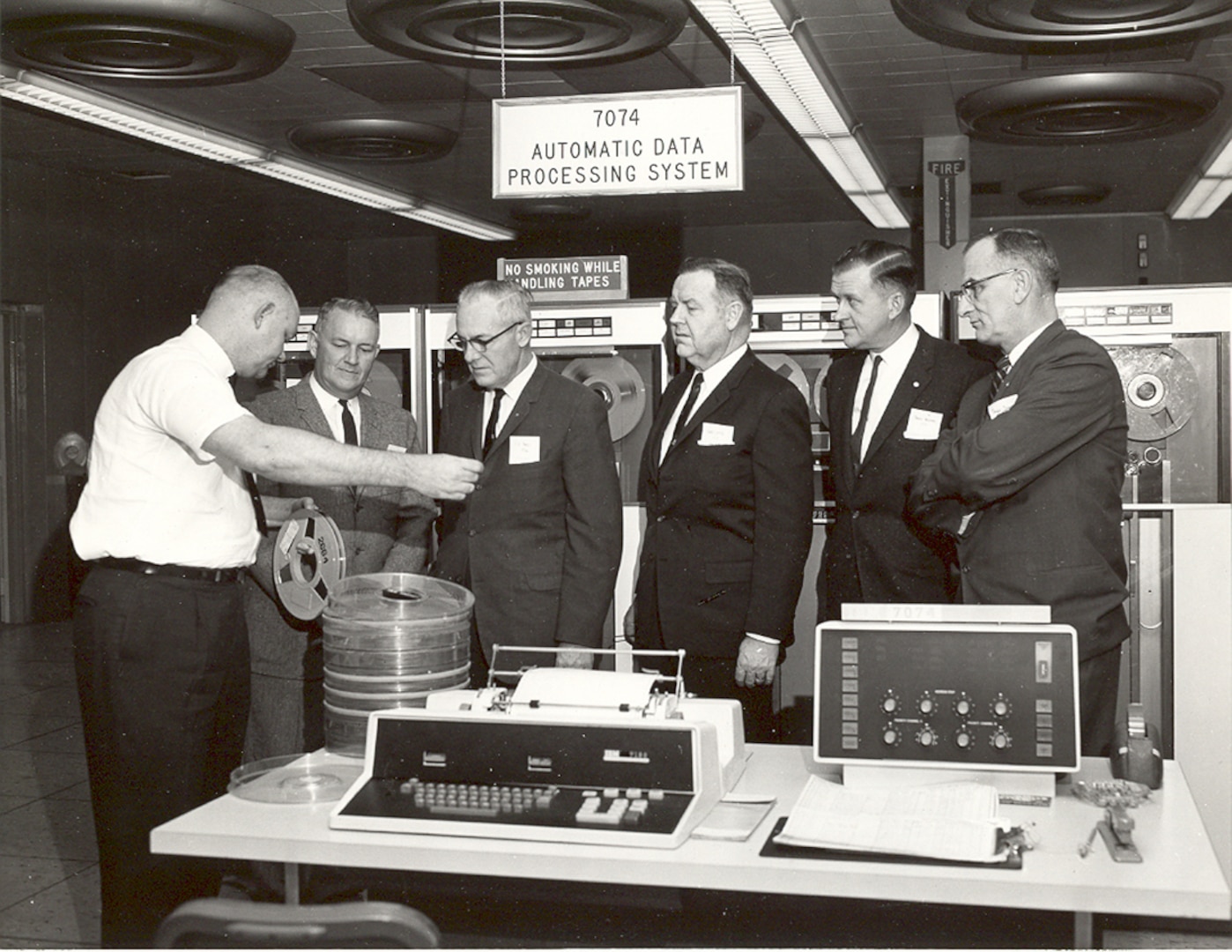 Six men learn how to use the Standard Automated Materiel Management System on IBM 360 computers in 1972.