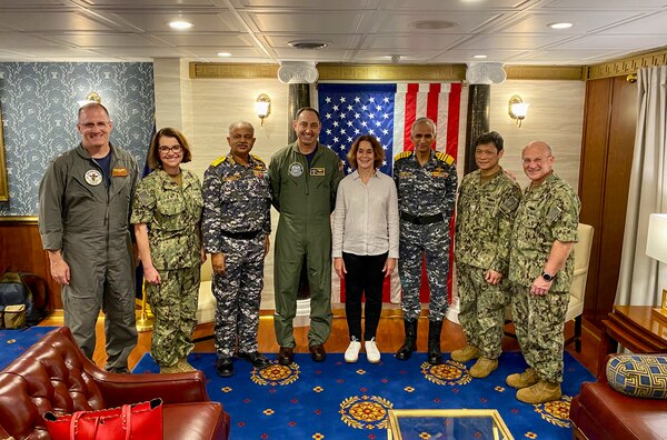 BAY OF BENGAL (Oct. 14, 2021) Chief of Naval Operations Adm. Mike Gilday, right, poses for a photo with distinguished visitors from the Indian Navy including Indian Chief of Naval Staff Adm. Karambir Singh and Vice Adm. A.B. Singh, Commander in Chief, Eastern Naval Command, U.S. Chargé d’Affaires Patricia Lacina, Rear Adm. Dan Martin, Commander, Carrier Strike Group 1, and other U.S. Navy senior leaders aboard USS Carl Vinson (CVN 70) during Exercise Malabar. MALABAR is a maritime exercise designed to improve integration, address common maritime security priorities and concerns, enhance interoperability and communication, and strengthen enduring relationships between the Royal Australian Navy, Royal Indian Navy, JMSDF, and U.S. maritime forces. (U.S. Navy photo by Cmdr. Nate Christensen/Released)