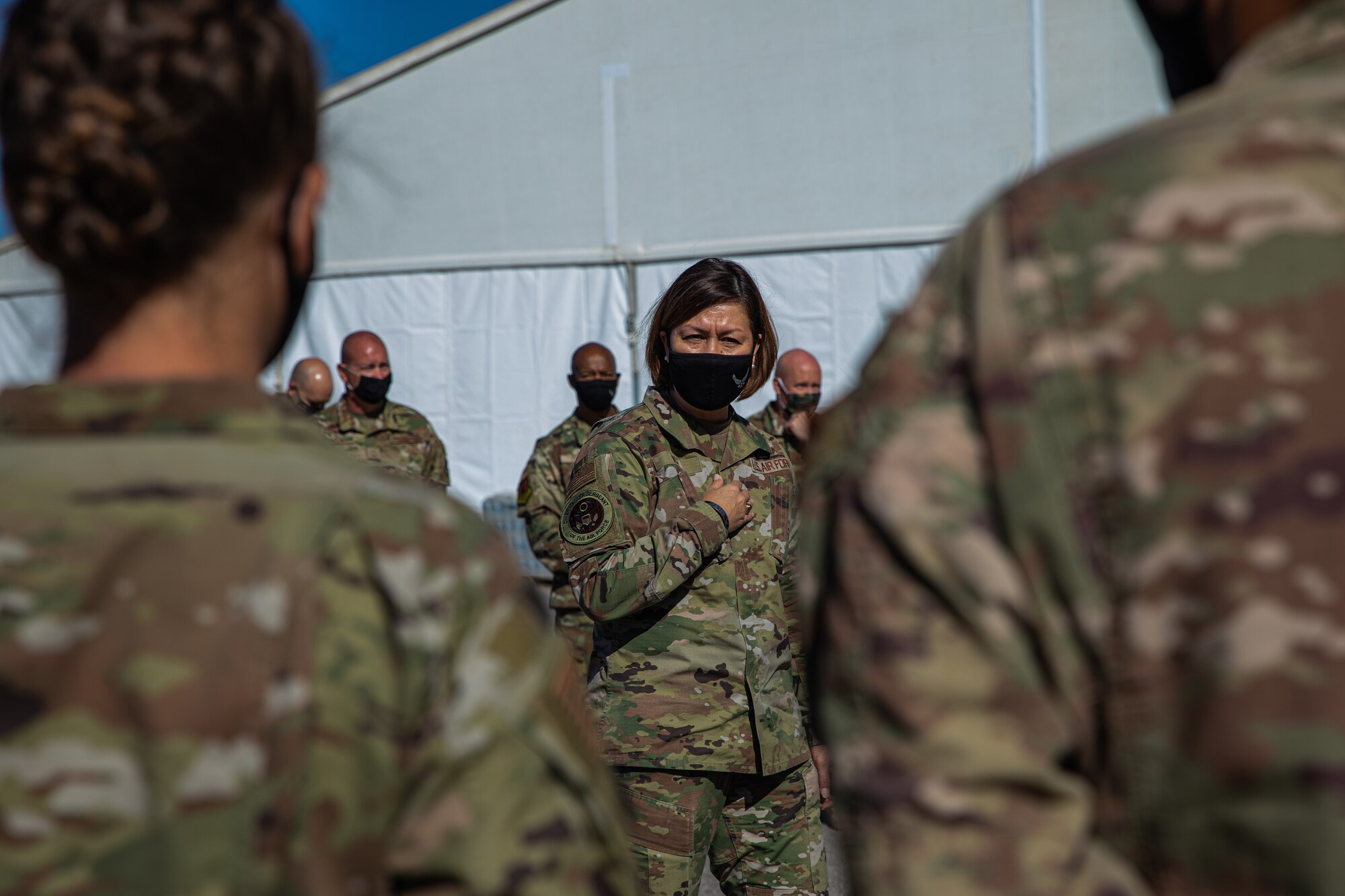 Chief Master Sgt. of the Air Force JoAnne S. Bass speaks with Task Force-Holloman Airmen at Aman Omid Village as part of a visit to Holloman Air Force Base, New Mexico, Oct. 13, 2021. The Department of Defense, through U.S. Northern Command, and in support of the Department of Homeland Security, is providing transportation, temporary housing, medical screening, and general support for at least 50,000 Afghan evacuees at suitable facilities, in permanent or temporary structures, as quickly as possible. This initiative provides Afghan personnel essential support at secure locations outside Afghanistan. (U.S. Army photo by Pfc. Anthony Sanchez)