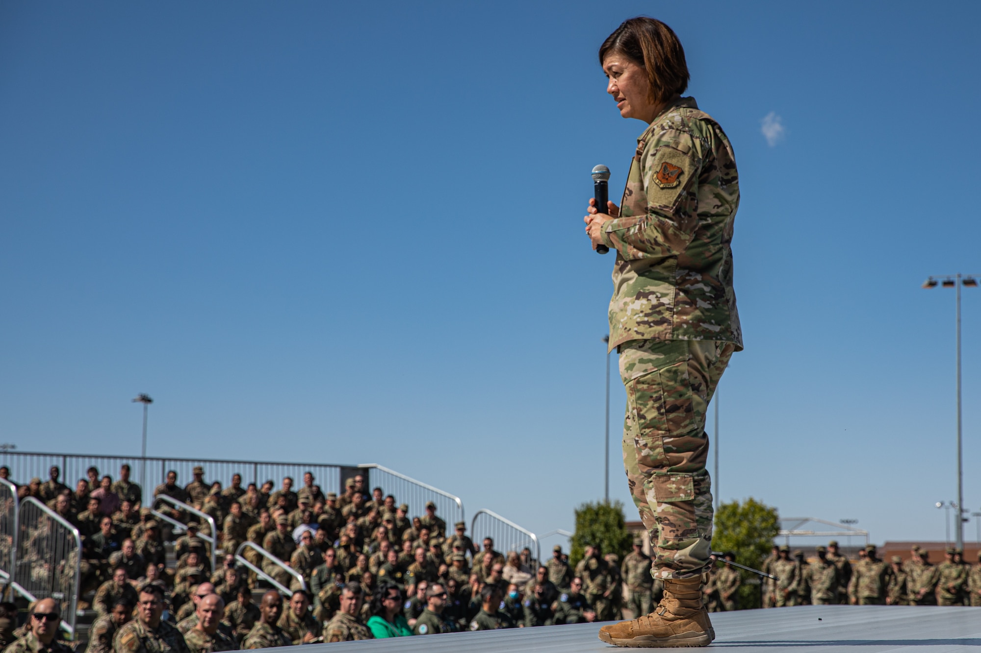 Chief Master Sgt. of the Air Force JoAnne S. Bass addresses Task Force-Holloman and 49th Wing Airmen and Guardians during an all call as part of a visit to Holloman Air Force Base, New Mexico, Oct. 13, 2021. The Department of Defense, through U.S. Northern Command, and in support of the Department of Homeland Security, is providing transportation, temporary housing, medical screening, and general support for at least 50,000 Afghan evacuees at suitable facilities, in permanent or temporary structures, as quickly as possible. This initiative provides Afghan personnel essential support at secure locations outside Afghanistan. (U.S. Army photo by Pfc. Anthony Sanchez)