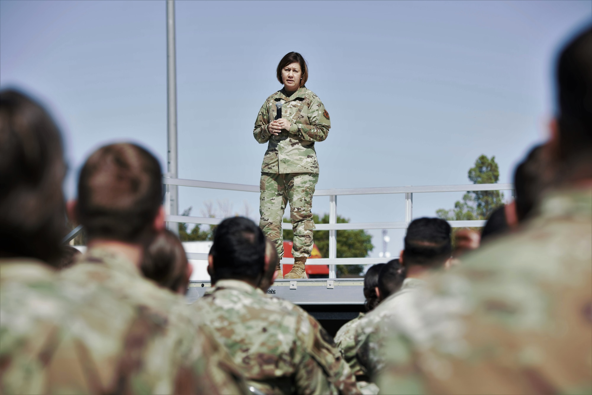 Chief Master Sgt. of the Air Force JoAnne S. Bass talks to Airmen and Guardians about the importance of their service and staying ready for anything as part of an all call at Holloman Air Force Base, New Mexico, Oct. 13, 2021. The Department of Defense, through U.S. Northern Command, and in support of the Department of State and Department of Homeland Security, is providing transportation, temporary housing, medical screening, and general support for at least 50,000 Afghan evacuees at suitable facilities, in permanent or temporary structures, as quickly as possible. This initiative provides Afghan evacuees essential support at secure locations outside Afghanistan. (U.S. Navy photo by Mass Communications Specialist 1st Class Sarah Rolin)