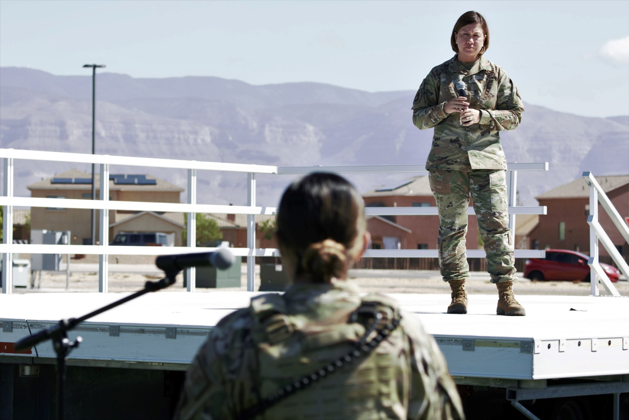 Chief Master Sgt. of the Air Force JoAnne S. Bass answers questions during a question and answer section of an all call as part of visit to Holloman Air Force Base, New Mexico, Oct. 13, 2021. The Department of Defense, through U.S. Northern Command, and in support of the Department of State and Department of Homeland Security, is providing transportation, temporary housing, medical screening, and general support for at least 50,000 Afghan evacuees at suitable facilities, in permanent or temporary structures, as quickly as possible. This initiative provides Afghan evacuees essential support at secure locations outside Afghanistan. (U.S. Navy photo by Mass Communications Specialist 1st Class Sarah Rolin)