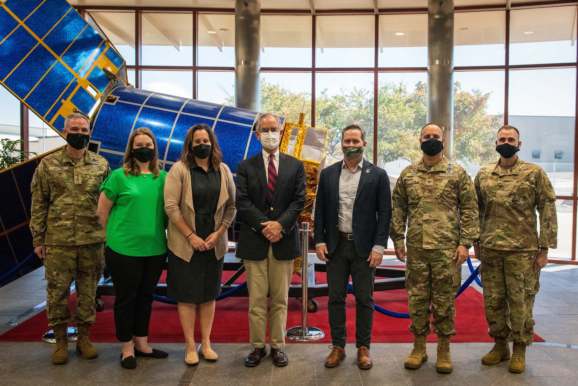 Congressman Jim Cooper, the U.S. Representative for Tennessee’s 5th congressional district, Congressman Michael Waltz, the U.S. Representative for Florida’s 6th congressional district, and U.S. Space Force leadership pose for a photo in front of a static Defense Support Program Satellite on Oct. 13, 2021, in the Mission Control Station lobby on Buckley Space Force Base, Colo. After a brief on Space Delta 4’s overall mission, the congressmen toured the Space Based Infrared Satellites operations floor and the Overhead Persistent Infrared Battlespace Awareness Center. (U.S. Space Force photo by Senior Airman Joshua T. Crossman)