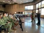 CMSgt Gaitan speaks to international students.