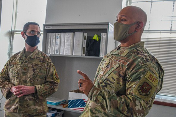 Master Sgt. Luis Gonzales Colon, 90th Security Forces Group A3 Superintendent, participates in a discussion with members of his office at F.E. Warren Air Force Base, Wyoming, Oct. 14, 2021. (U.S. Air Force graphic by Airman 1st Class Charles Munoz)