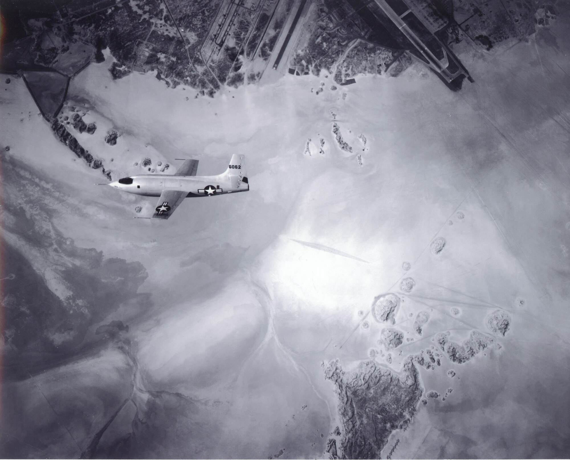 Then Capt. Charles "Chuck" Yeager pilots a Bell X-1 on final approach above Edwards Air Force Base, California. (Photo courtesy of Air Force Test Center History Office)
