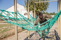 U.S. Marine Corps Staff Sgt. Alvaro Hernandez, a native of La Quinta, Calif., and a platoon sergeant with 1st Battalion, 6th Marine Regiment, 2d Marine Division, participates in an obstacle course during Exercise Baccarat