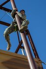 U.S. Marine Corps Lance Cpl. Genaro Soto, a native of Coachella, Calif., with 1st Battalion, 6th Marine Regiment, 2d Marine Division, slides down an obstacle during Exercise Baccarat