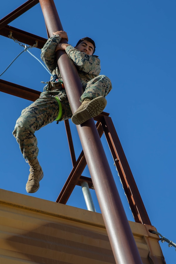 U.S. Marine Corps Lance Cpl. Genaro Soto, a native of Coachella, Calif., with 1st Battalion, 6th Marine Regiment, 2d Marine Division, slides down an obstacle during Exercise Baccarat on Caserne Colonel de Chabrières Nîmes, France, Oct. 8, 2021. Exercise Baccarat is a three-week joint exercise between 2d MARDIV and the French Foreign Legion that challenges forces with physical and tactical training, as well as provides the opportunity to exchange knowledge that assists in developing and strengthening bonds. (U.S. Marine Corps photo by Lance Cpl. Jennifer E. Reyes)