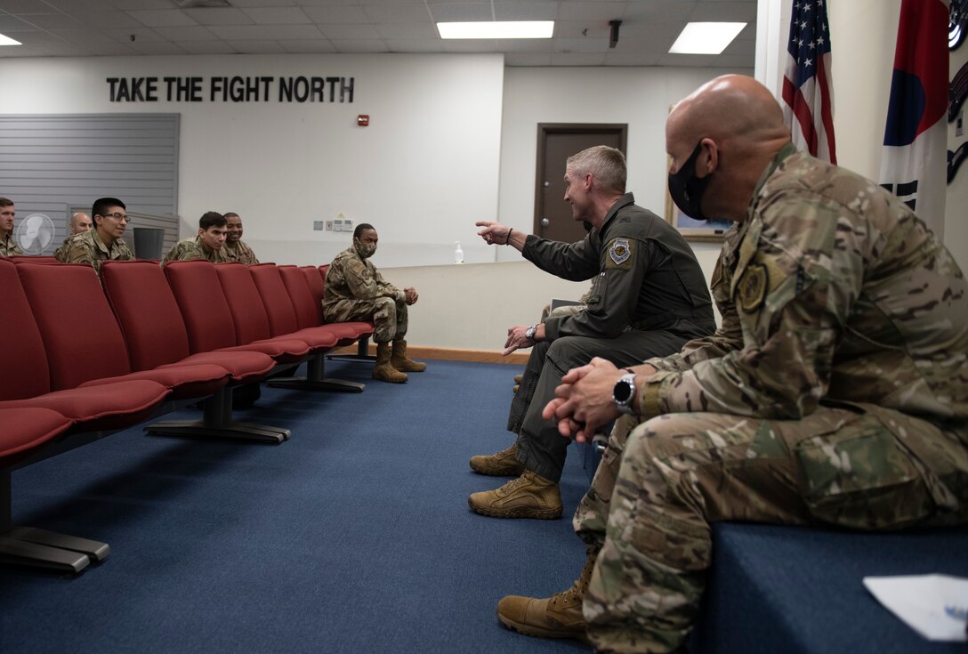 Brig. Gen. Jason Rueschhoff, 7th Air Force deputy commander, speaks to junior enlisted during a mentorship session at Kunsan Air Base, Republic of Korea, Oct. 14, 2021. Rueschhoff covered topics such as sexual assault, leadership, future plans for the force and strategic competition both on peninsula and across the area of responsibility. (U.S. Air Force photo by Senior Airman Suzie Plotnikov)