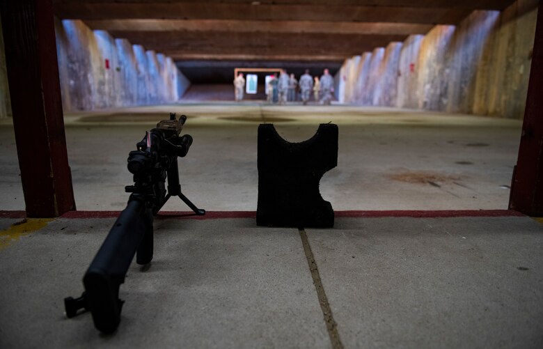 Eighth Fighter Wing leadership and Brig. Gen. Jason Rueschhoff, 7th Air Force deputy commander, receive a tour of the indoor shooting range at Kunsan Air Base, Republic of Korea, Oct. 14, 2021. Rueschhoff also visited the O’Malley Dining Facility, enlisted dorms, flightline and received a Rapid Airfield Damage Assessment demonstration. (U.S. Air Force photo by Senior Airman Suzie Plotnikov)