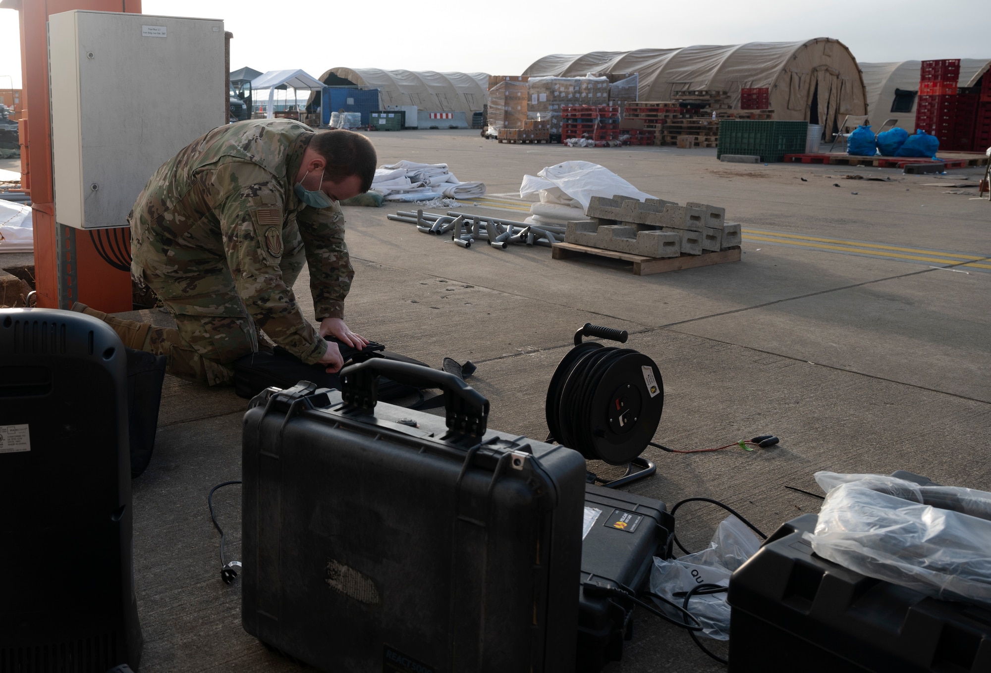 U.S. Air Force Airman 1st Class Joseph Anderson, 86th Communications Squadron radio frequency transmissions technician, packs up public announcement equipment at Ramstein Air Base, Germany, Oct. 15, 2021. U.S. service members and partners removed military equipment while contractors deconstructed tents and remove remaining equipment. (U.S. Air Force photo by Senior Airman Thomas Karol)