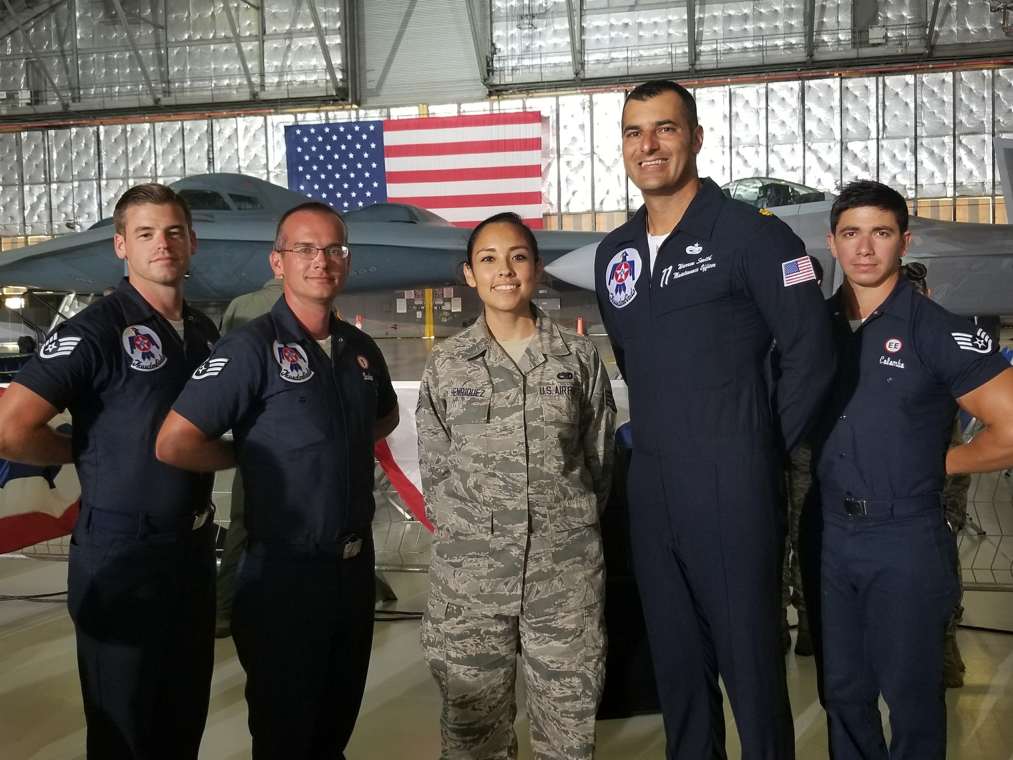 Then Staff Sgt. Sandra Henriquez, 459th Maintenance Squadron, aero repair technician, poses for a photo with the U.S. Air Force Thunderbirds during an airshow in 2017. (Courtesy Photo
