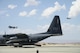 Pictured above are two two aircraft preparing to land on a runway in the desert.