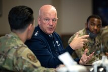 General Raymond speaks to a male guardian