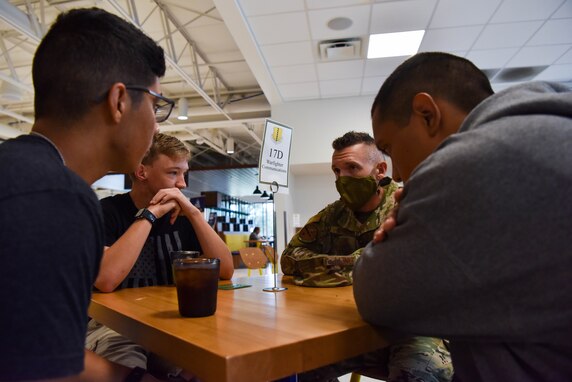 U.S. Air Force Maj. William Bennett, 17th Communications Squadron commander talks to Air Force ROTC students during the Senior Leaders’ Conference at Angelo State University San Angelo, Texas, Oct. 13, 2021. Goodfellow senior leaders spent time with ASU students to answer questions about specific career fields in the Air Force. (U.S. Air Force photo by Senior Airman Jermaine Ayers)