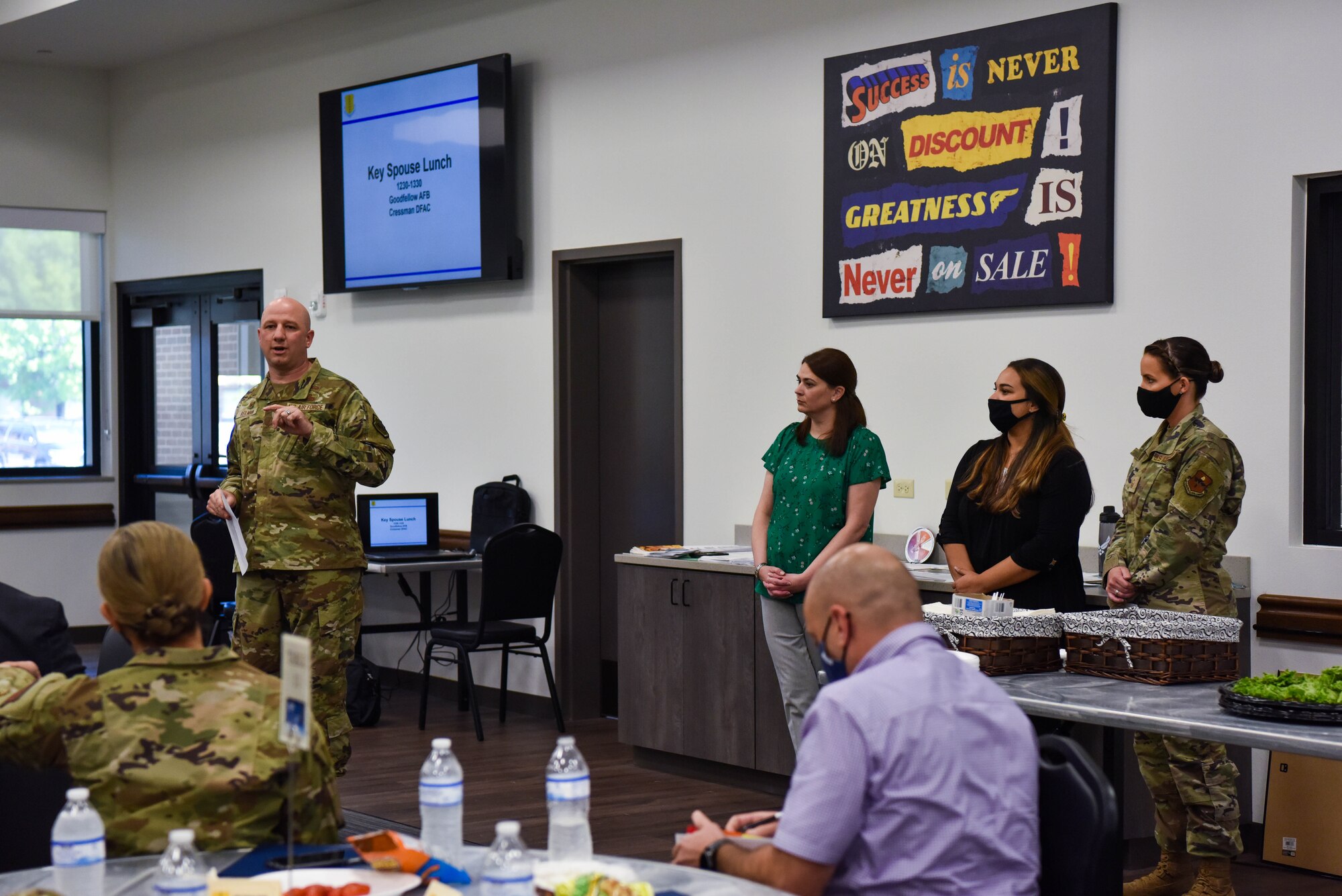 U.S. Air Force Col. Matthew Reilman, 17th Training Wing commander and his wife, Kate, talk during the Key Spouse Lunch at the Cressman Dinning facility on Goodfellow Air Force Base, Texas, Oct. 14, 2021. During the lunch Reilman shared his goals for the Key Spouse Program moving into the future. (U.S. Air Force photo by Senior Airman Jermaine Ayers)