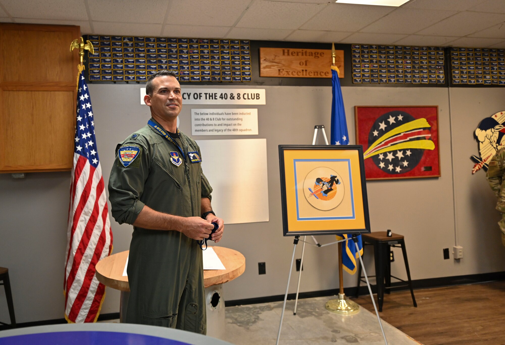 U.S. Air Force Lt. Col. Nelson Prouty, 48th Flying Training Squadron commander, speaks at the opening of their squadron’s heritage room Oct. 8, 2021, on Columbus Air Force Base, Miss. The tanker and airlift track of specialized undergraduate pilot training is conducted by the 48th Flying Training Squadron. (U.S. Air Force photo by Airman 1st Class Jessica Haynie)