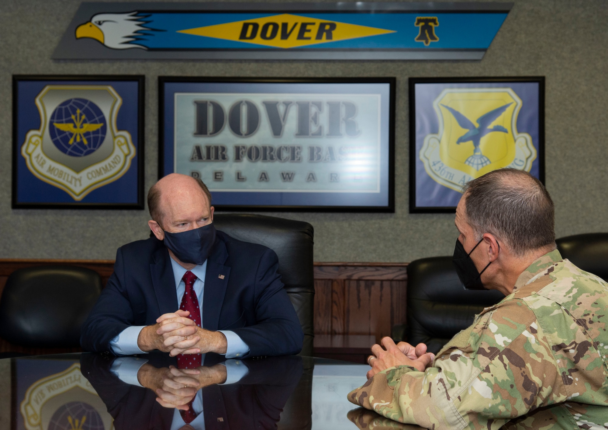 Col. Matt Husemann, right, 436th Airlift Wing commander, speaks with U.S. Sen. Chris Coons at Dover Air Force Base, Delaware, Oct. 15, 2021. Coons visited the base to meet with Airmen from various career fields who deployed during Operation Allies Refuge, as well as personnel from the 436th Civil Engineer Squadron fire department. (U.S. Air Force photo by Roland Balik)
