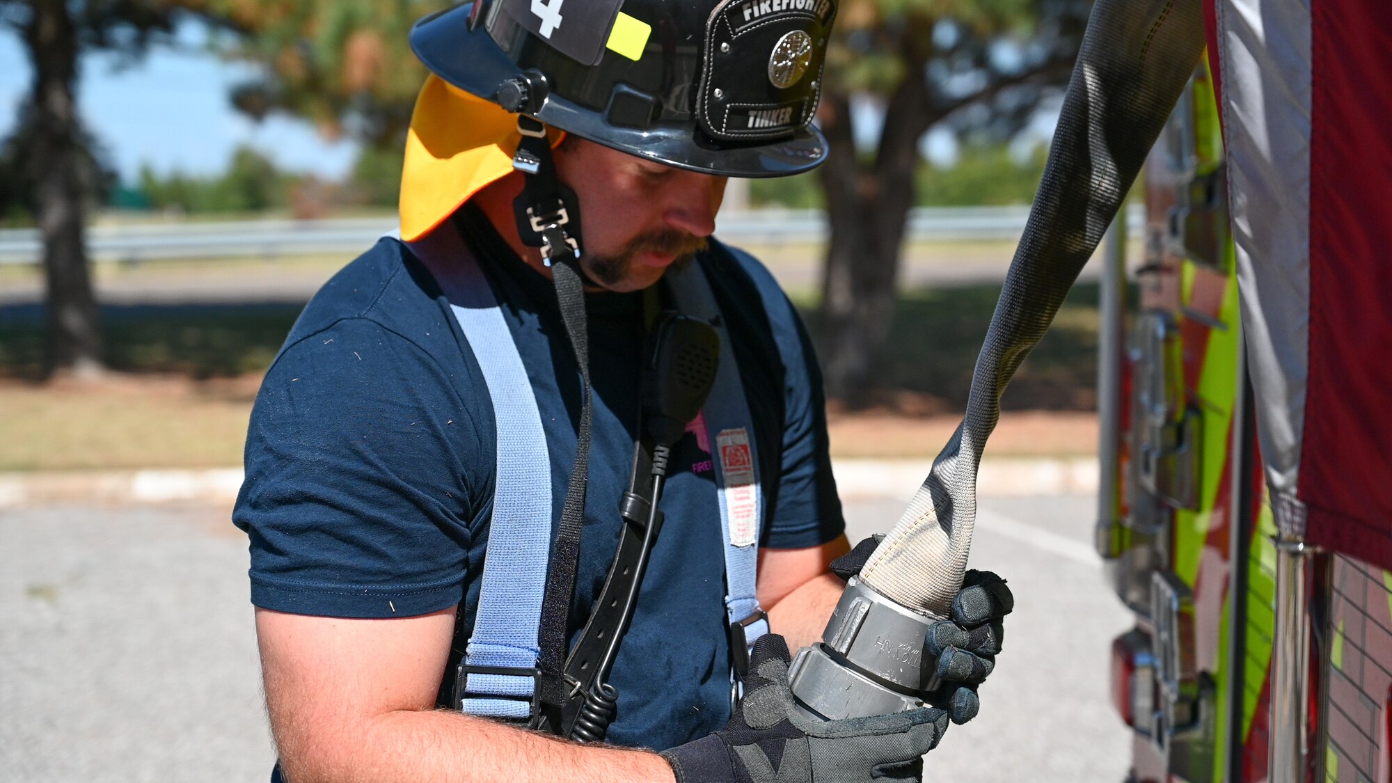 Firefighter holding a fire hose