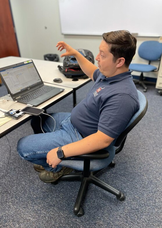 USACE Civil Engineer Project Manager Omar Acevedo meets with him team to discuss data compiled from the Waverly, Tennessee flood to create a cost estimate for replacement for rehabilitation of Waverly Elementary and Waverly Junior High School.
