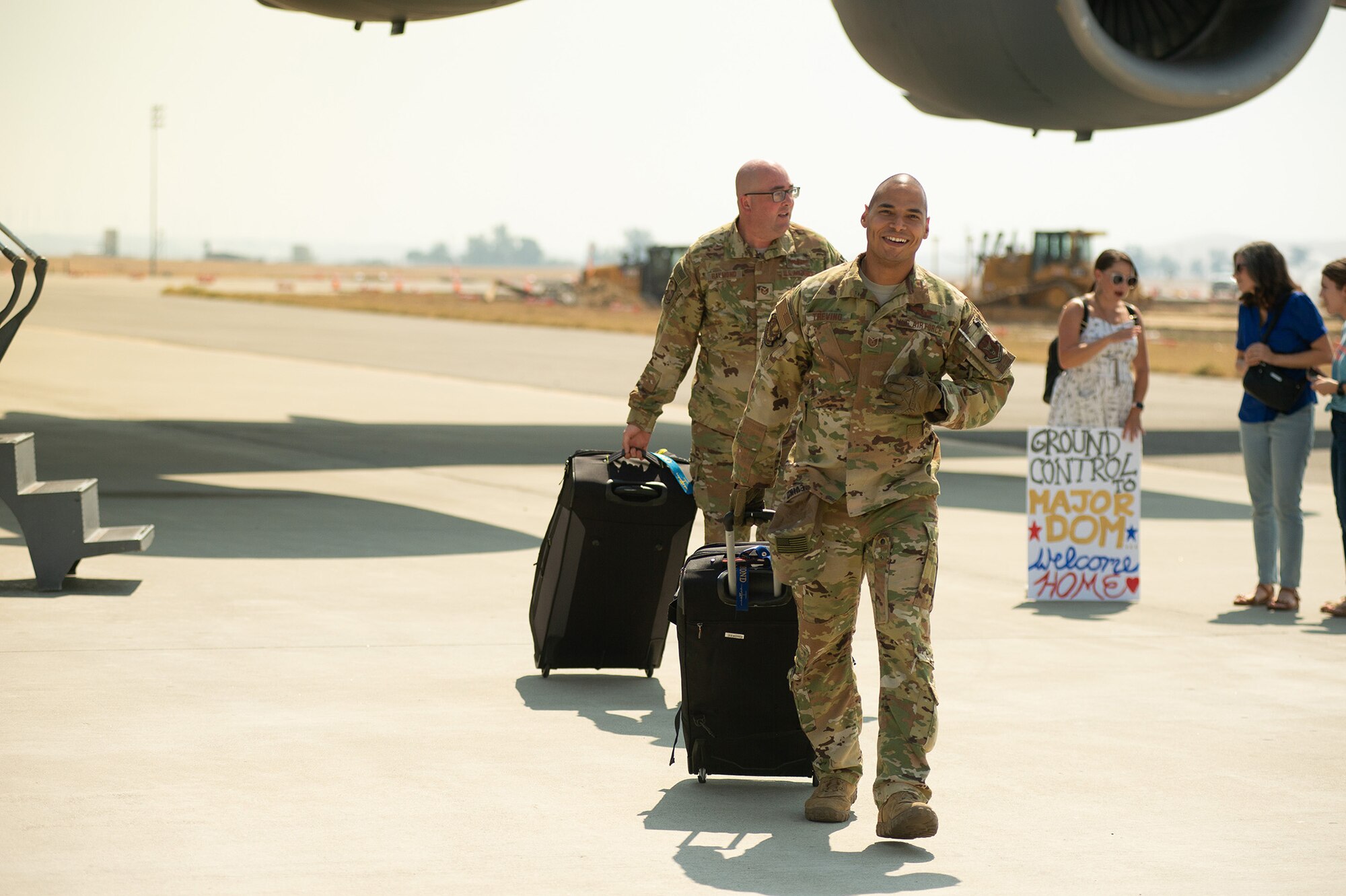 Reserve Citizen Airmen from the 301st Airlift Squadron reunite with their friends and families at Travis Air Force Base, California, Sept. 14, 2021. The U.S. Air Force C-17 Globemaster III aircrew helped evacuate hundreds of American citizens, Special Immigrant Visa applicants and vulnerable Afghans from Afghanistan in support of Operation Allies Welcome.