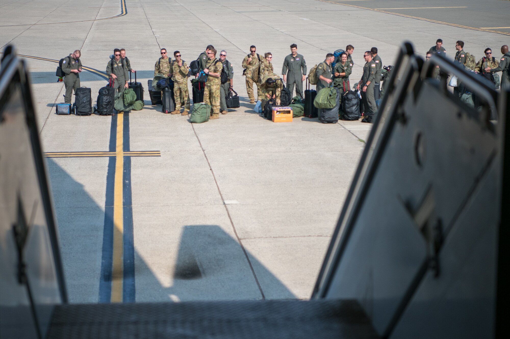 A C-5M Super Galaxy loaded with cargo, passenger seats and aircrews from the 349th Air Mobility Wing at Travis Air Force Base, California, is prepared for departure prior to a mission supporting the Afghanistan evacuation, Aug. 21, 2021. The 349th AMW is providing rapid global mobility to assist the U.S. State Department in the safe evacuation of Americans and allied civilian personnel from Afghanistan