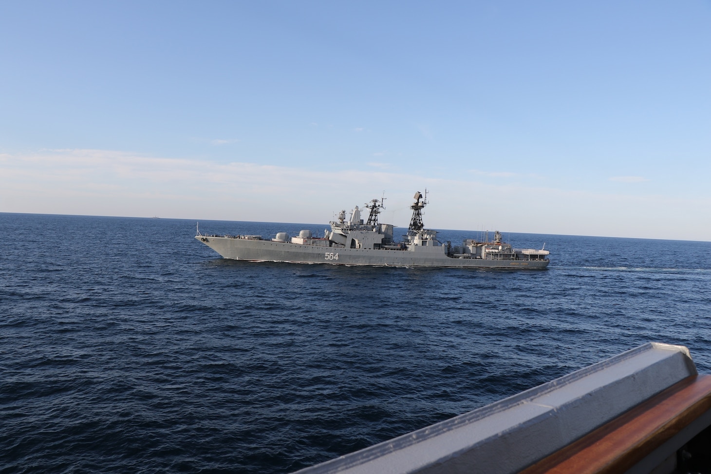 A Russian Udaloy-class destroyer interacts with USS Chafee (DDG 90), while Chafee conducts routine operations in international waters in the Sea of Japan.