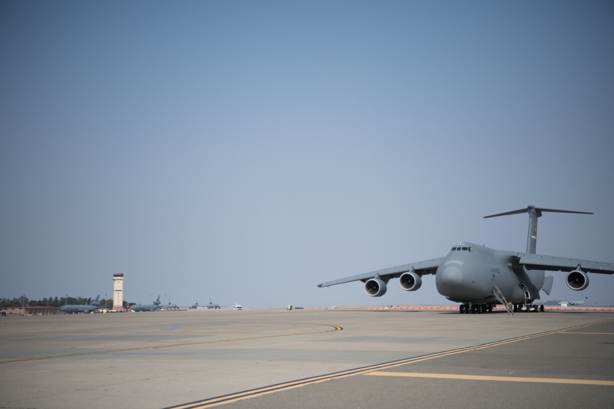 A C-5M Super Galaxy loaded with cargo, passenger seats and aircrews from the 349th Air Mobility Wing at Travis Air Force Base, California, is prepared for departure prior to a mission supporting the Afghanistan evacuation, Aug. 21, 2021. The 349th AMW is providing rapid global mobility to assist the U.S. State Department in the safe evacuation of Americans and allied civilian personnel from Afghanistan