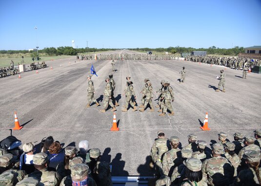 The 316th Training Squadron black ropes conduct a regulation sequence during the regulation portion of the 17th Training Group drill competition.