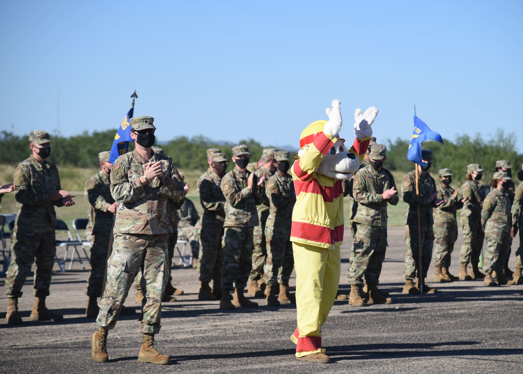 Goodfellow members cheer in participation of a spirit competition during the 17th Training Group drill competition.