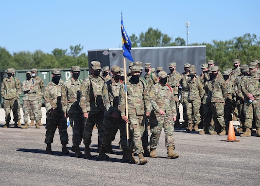 The 312th Training Squadron black ropes march during the 17th Training Group quarterly drill competition.