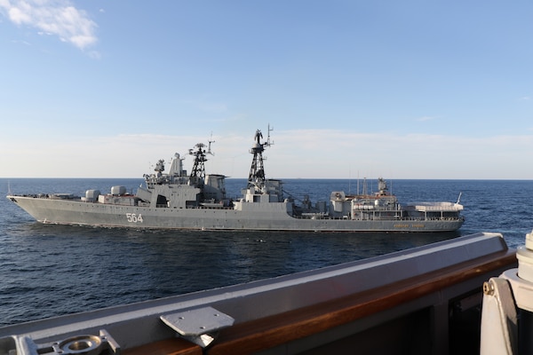 A Russian Udaloy-class destroyer interacts with USS Chafee (DDG 90), while Chafee conducts routine operations in international waters in the Sea of Japan.