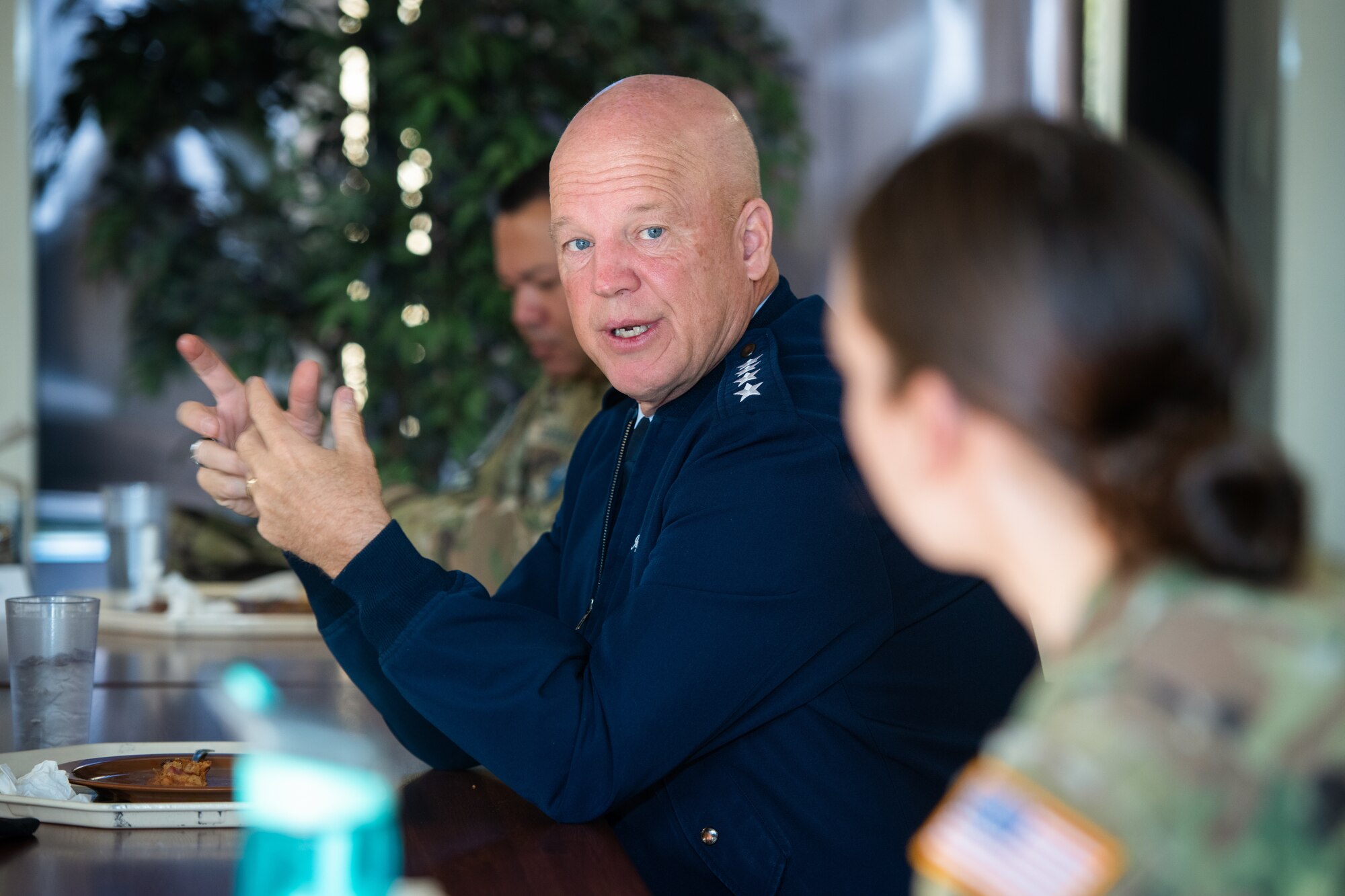 General Raymond speaks with a female guardian