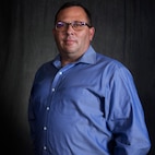 Jason Cooper, an AOS with Underwater Warfighting Development Center (UWDC), Detachment Arctic Submarine Laboratory (ASL), works closely with Commander, Submarine Forces (COMSUBFOR) in Norfolk, Virginia.