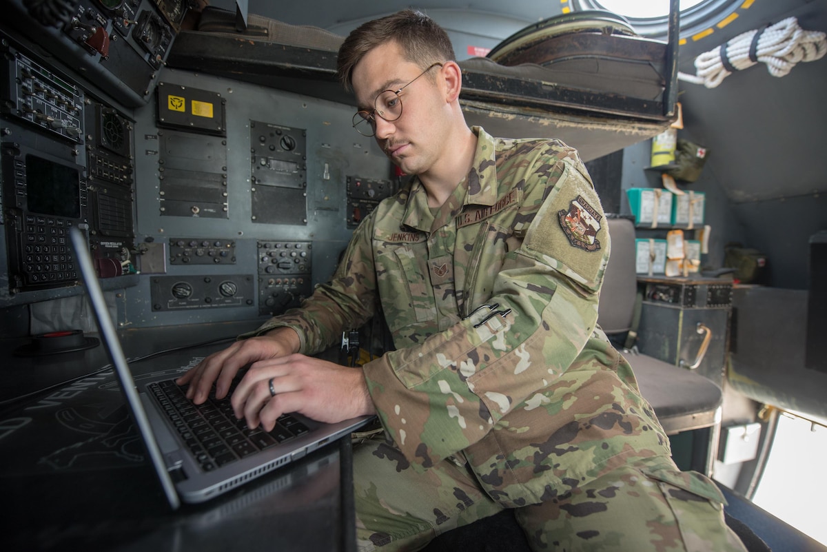 Staff Sgt. Harrison Jenkins, an intelligence analyst with the Kentucky Air National Guard’s 123rd Operations Support Squadron, performs inflight aircrew training aboard a C-130 Hercules at Muñiz Air National Guard Base in Carolina, Puerto Rico, on June 16, 2021. Jenkins is the Kentucky Air National Guard's Outstanding Airman of the Year for 2021. (U.S. Air National Guard photo by Phil Speck)