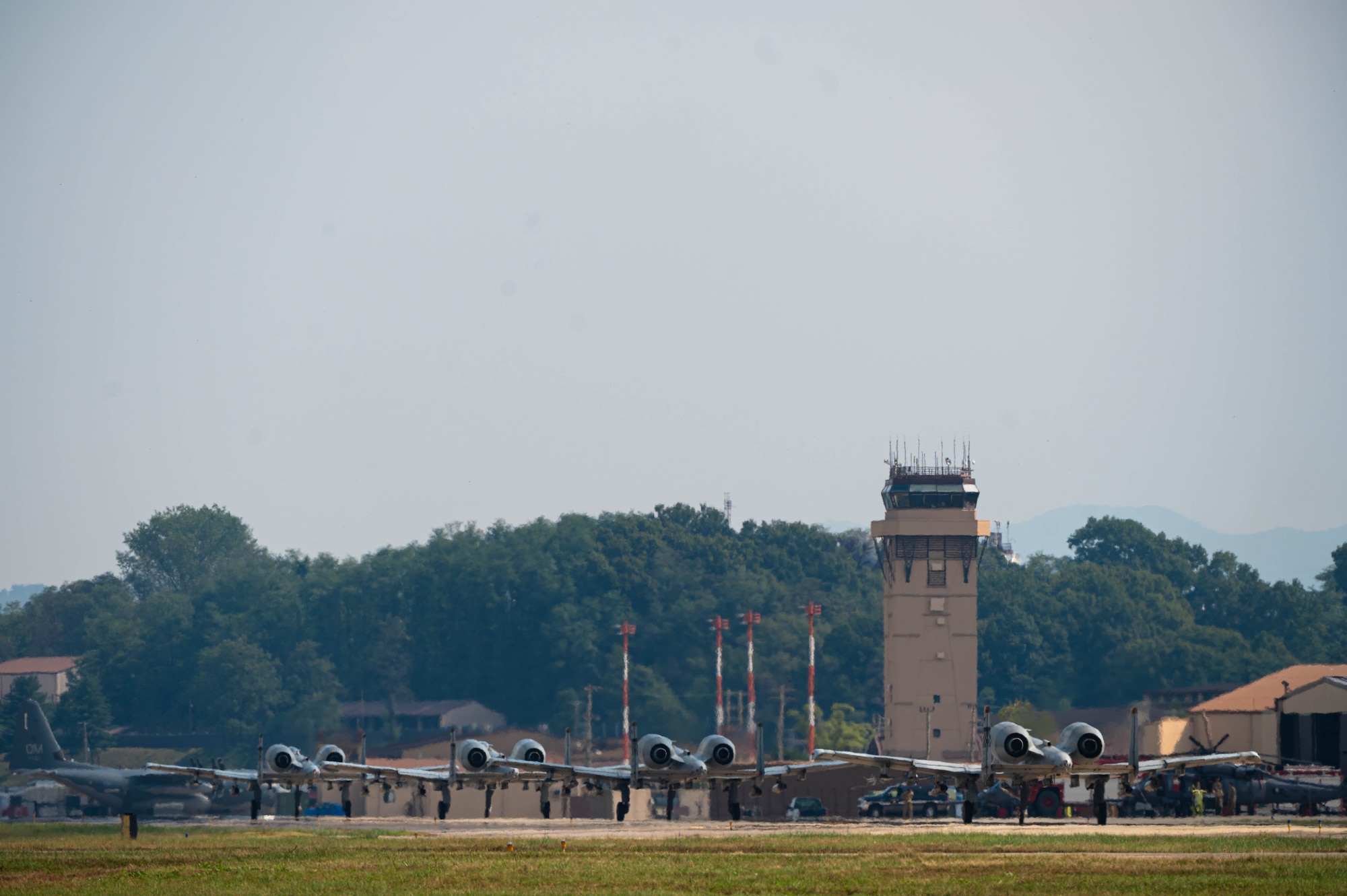 Four A-10 Thunderbolt II “Warthog’s” taxi down the runway.